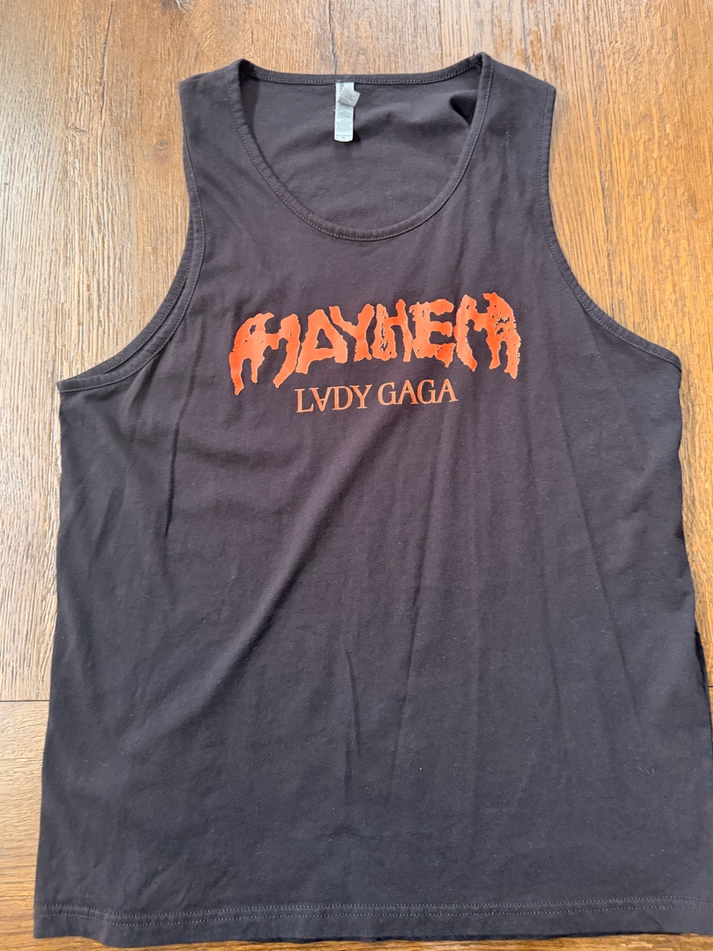 Next Level Apparel Black Tank Top with Orange "Mayhem" Lady Gaga Graphic